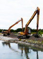 October 2008: The excavators begin their dance.