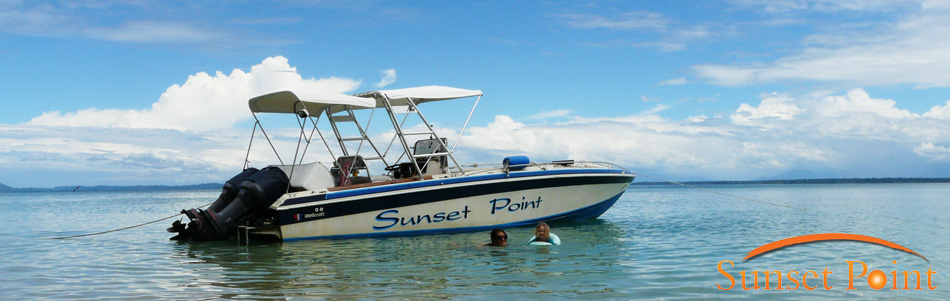 The Sunset Point boat wth a couple of visitors relaxing.