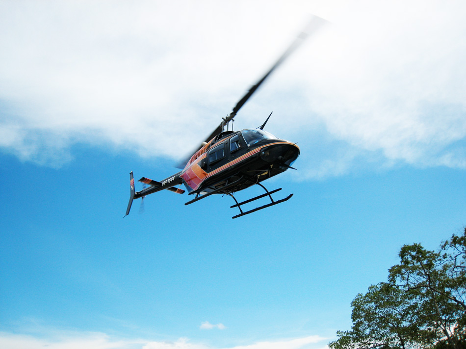The helicopter leaves Sunset Point beach.